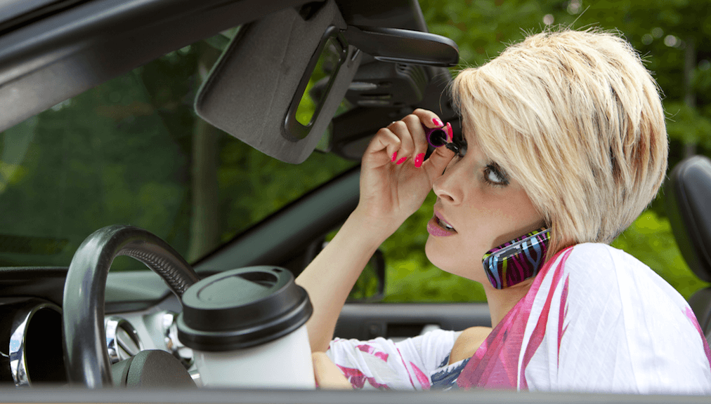 Woman Driving Distracted